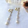 Axe and crescendo pearl back drop earrings - Image 4