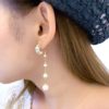 Axe and crescendo pearl back drop earrings - Image 5