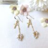 White pearl fruits and cross earrings - Image 3