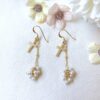 White pearl fruits and cross earrings - Image 4